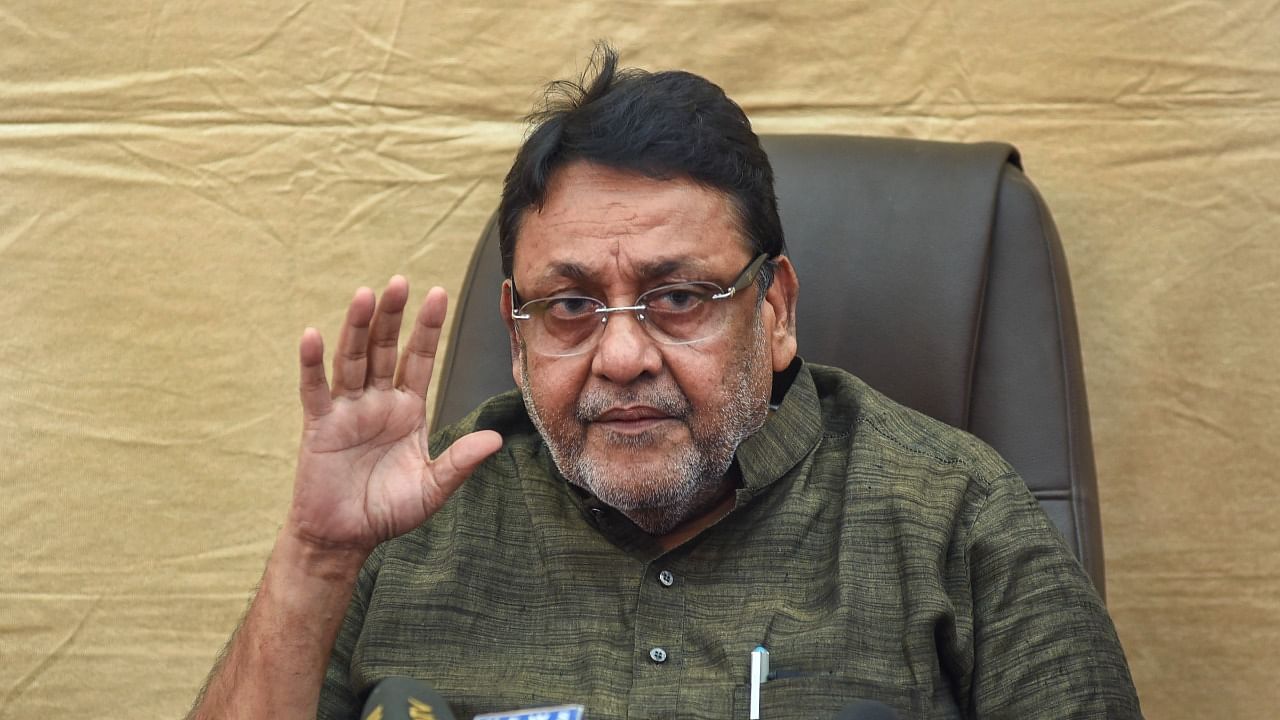 Maharashtra Minister Nawab Malik addresses media during a press conference at Kurla in Mumbai. Credit: PTI Photo