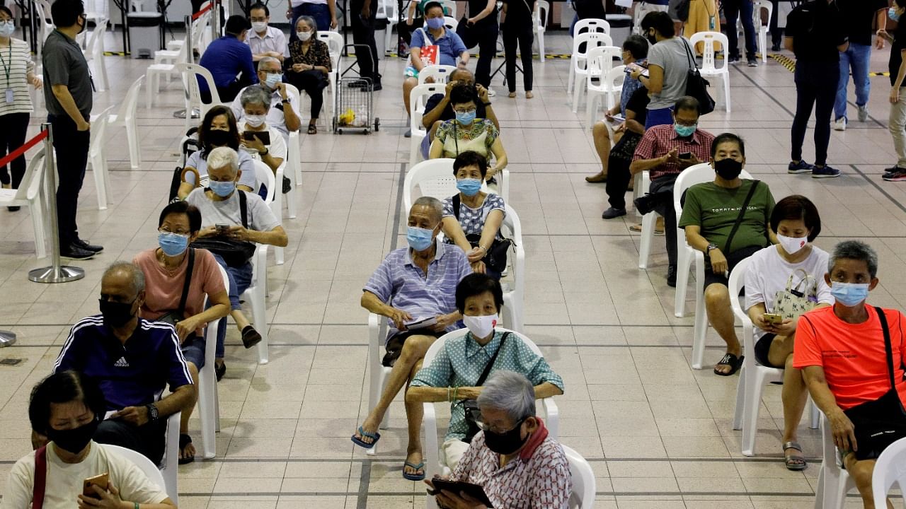 Singapore has moved from a zero-tolerance strategy to living with the virus. Credit: AFP Photo