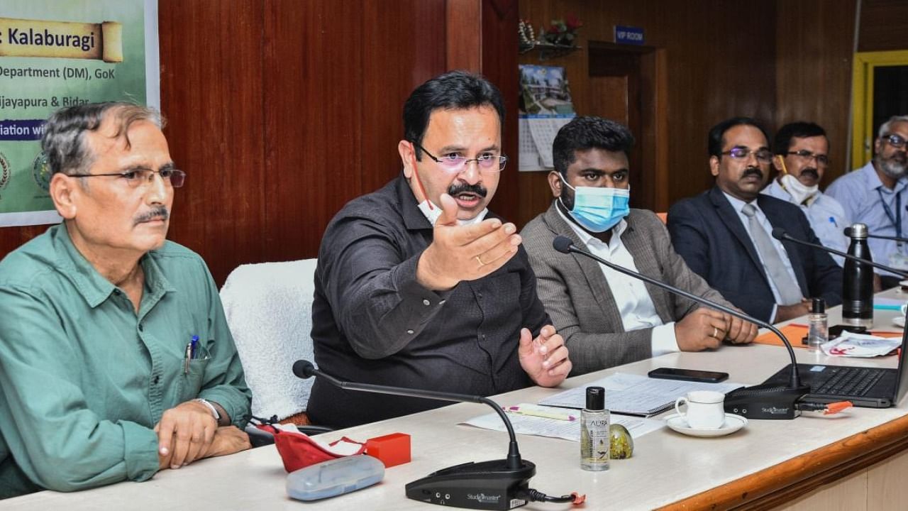 Karnataka State Disaster Management Authority Commissioner Manoj Rajan (2nd from left). Credit: Special Arrangement