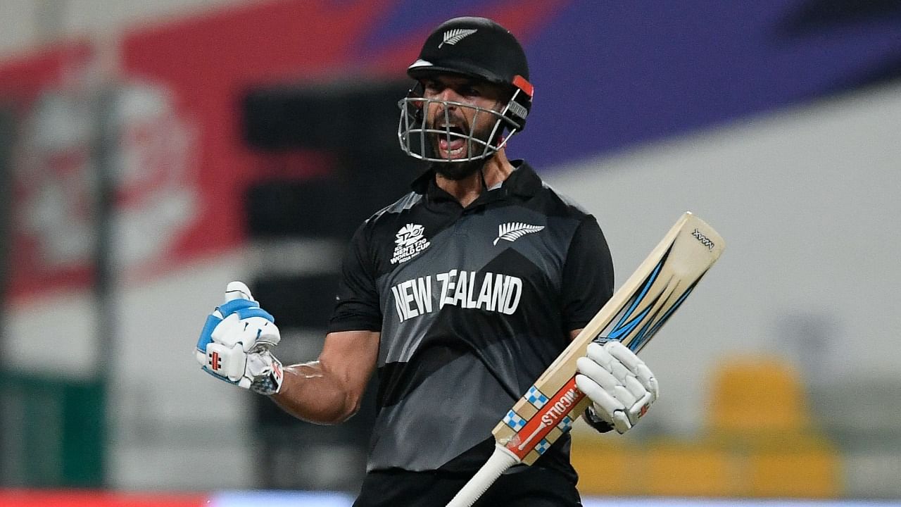 New Zealand's Daryl Mitchell celebrates after playing the winning shot against England in the T20 World Cup semi-final. Credit: AFP Photo