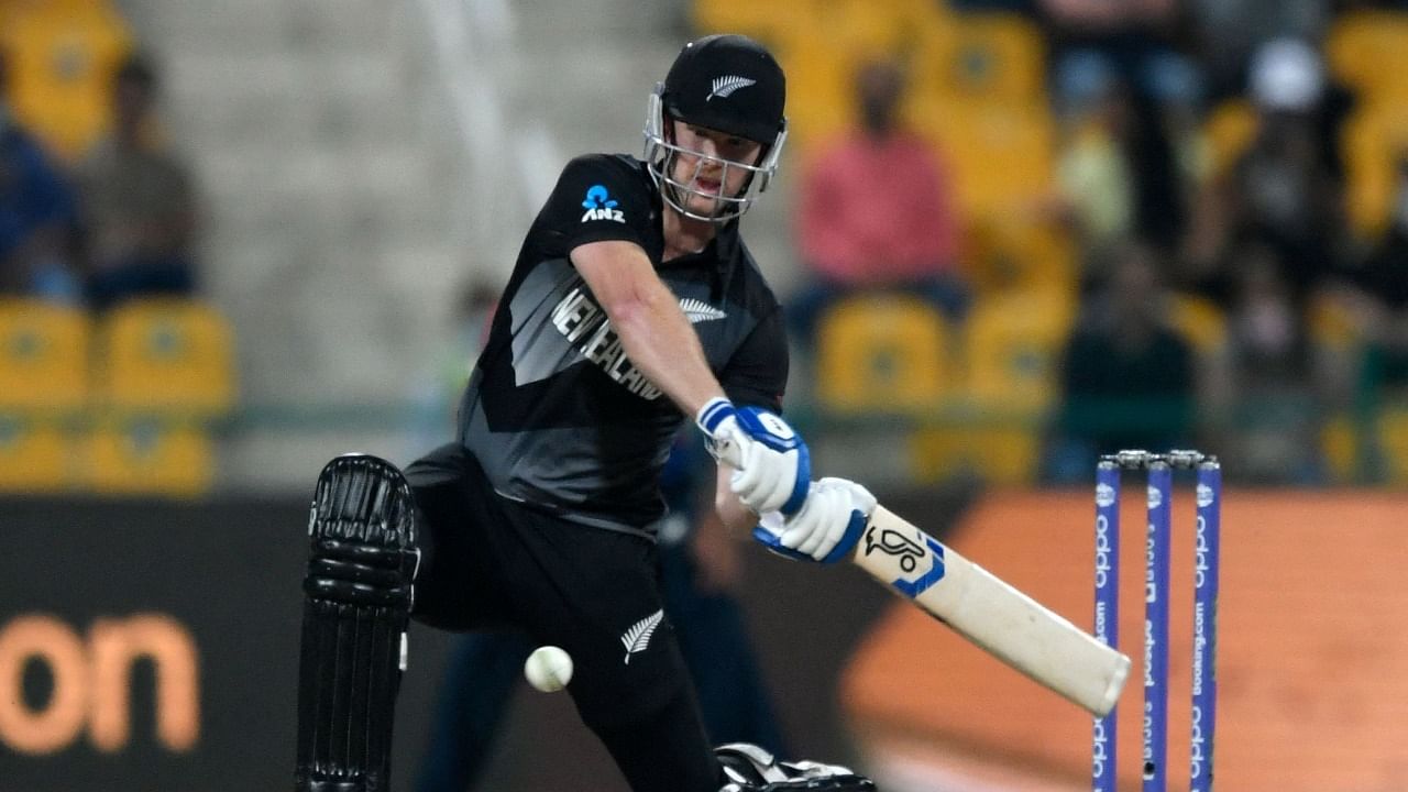 New Zealand's James Neesham hits a six during the ICC Men's T20 World Cup semi-final against England. Credit: Reuters Photo