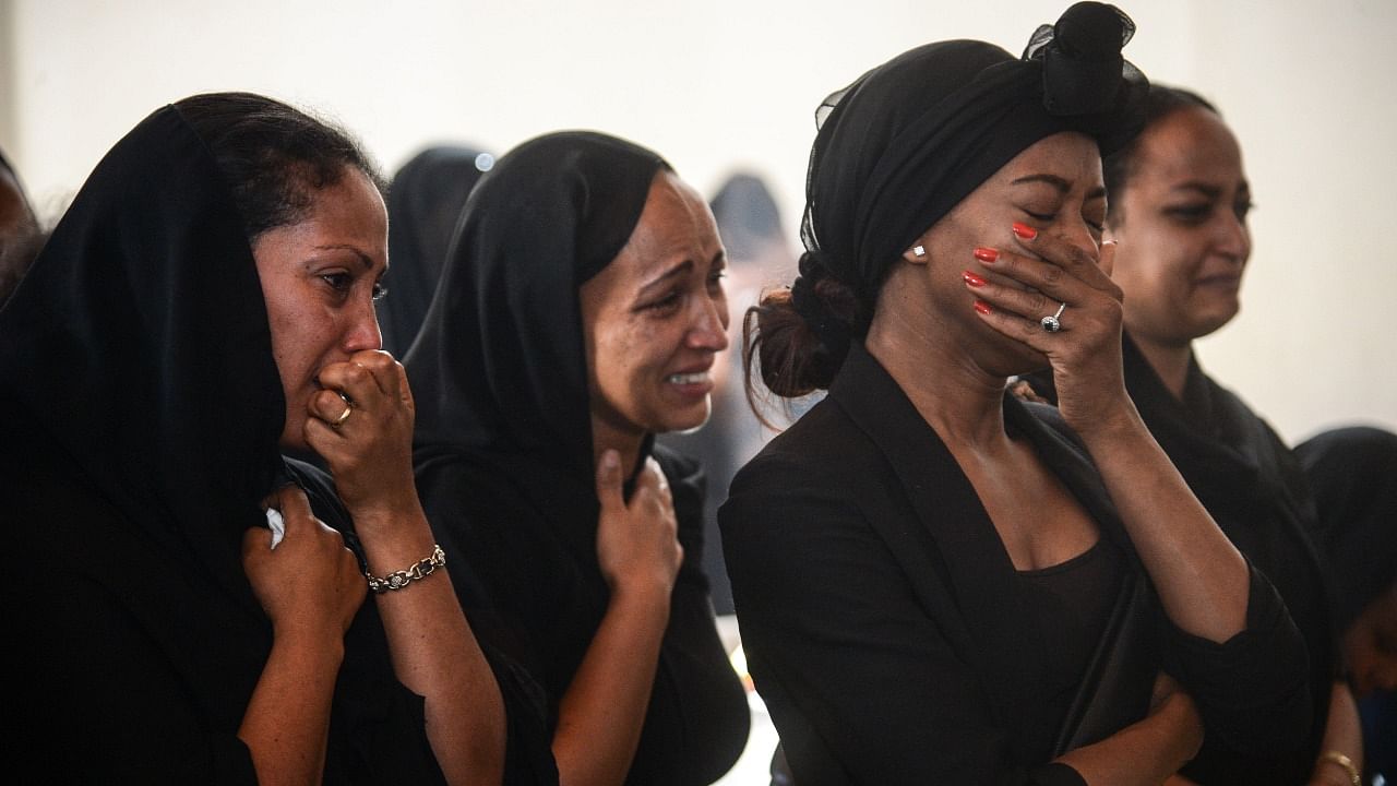 Women mourn during a memorial ceremony for the seven crew members who died in the Ethiopian Airlines accident. Credit: AFP File Photo