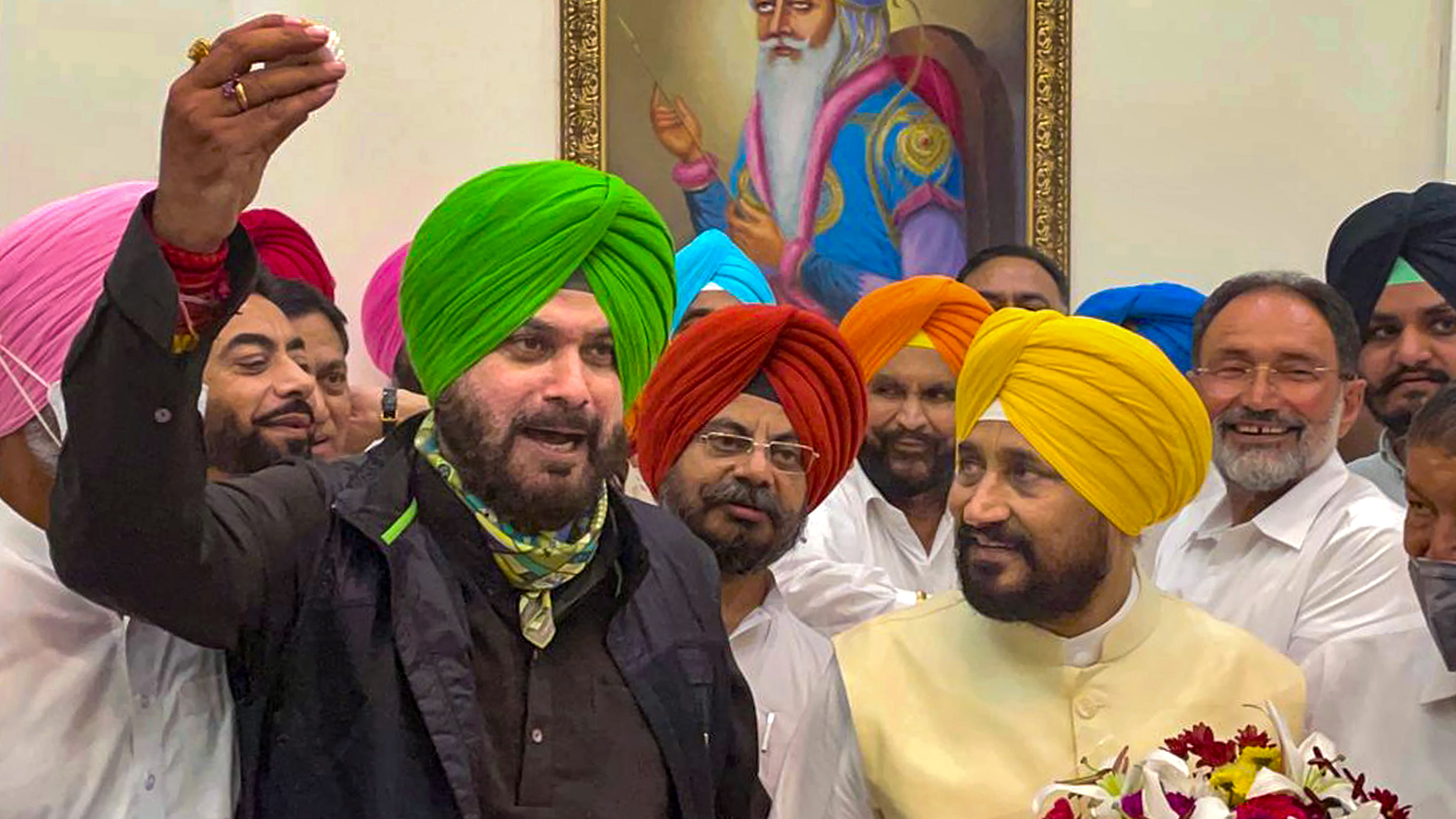 The turf war between the Chief Minister Channi and Navjot Singh Sidhu toned down on Tuesday when the Punjab Cabinet accepted the resignation of Advocate General A.P.S. Deol. Credit: PTI File Photo
