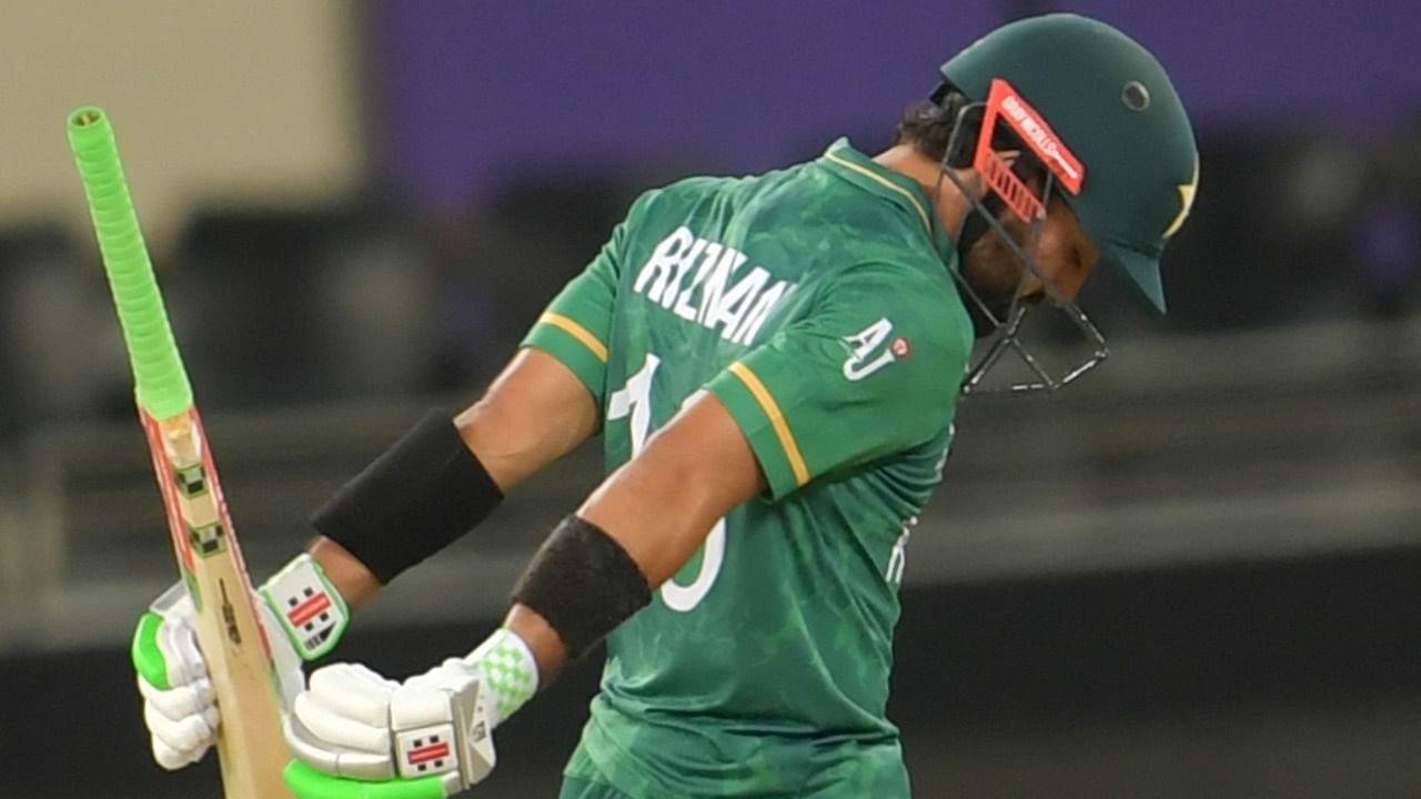 Pakistan's Mohammad Rizwan celebrates after scoring half century during the Cricket Twenty20 World Cup semi-final match between Pakistan and Australia in Dubai, UAE. Credit: IANS