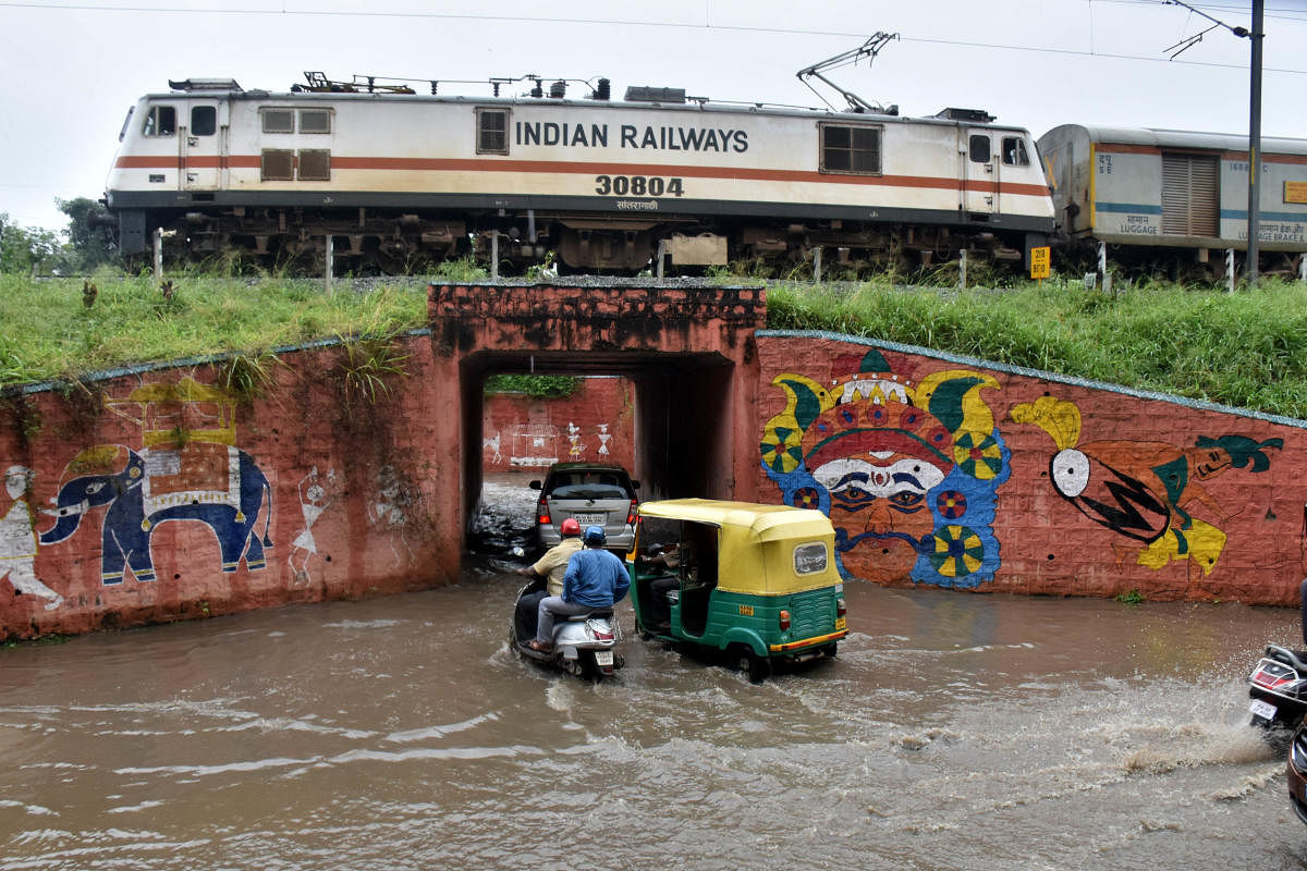A flooded underpass at Nagashettyhalli on Thursday. DH Photo/B K Janardhan