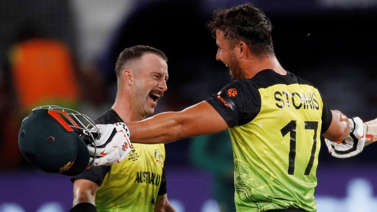 Australia's Matthew Wade and Australia's Marcus Stoinis celebrate after the match. Credit: Reuters Photo