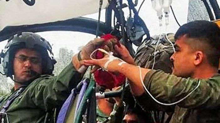 Injured soldiers being airlifted after their convoy was attacked by militants, in Churachandpur district. Credit: PTI Photo