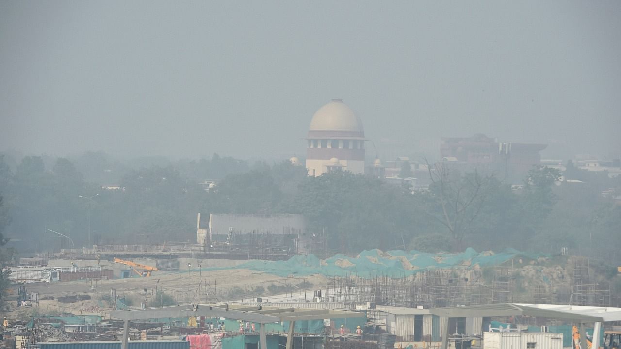 A view of the Supreme Court of India, shrouded in smog, in New Delhi. Credit: PTI File Photo