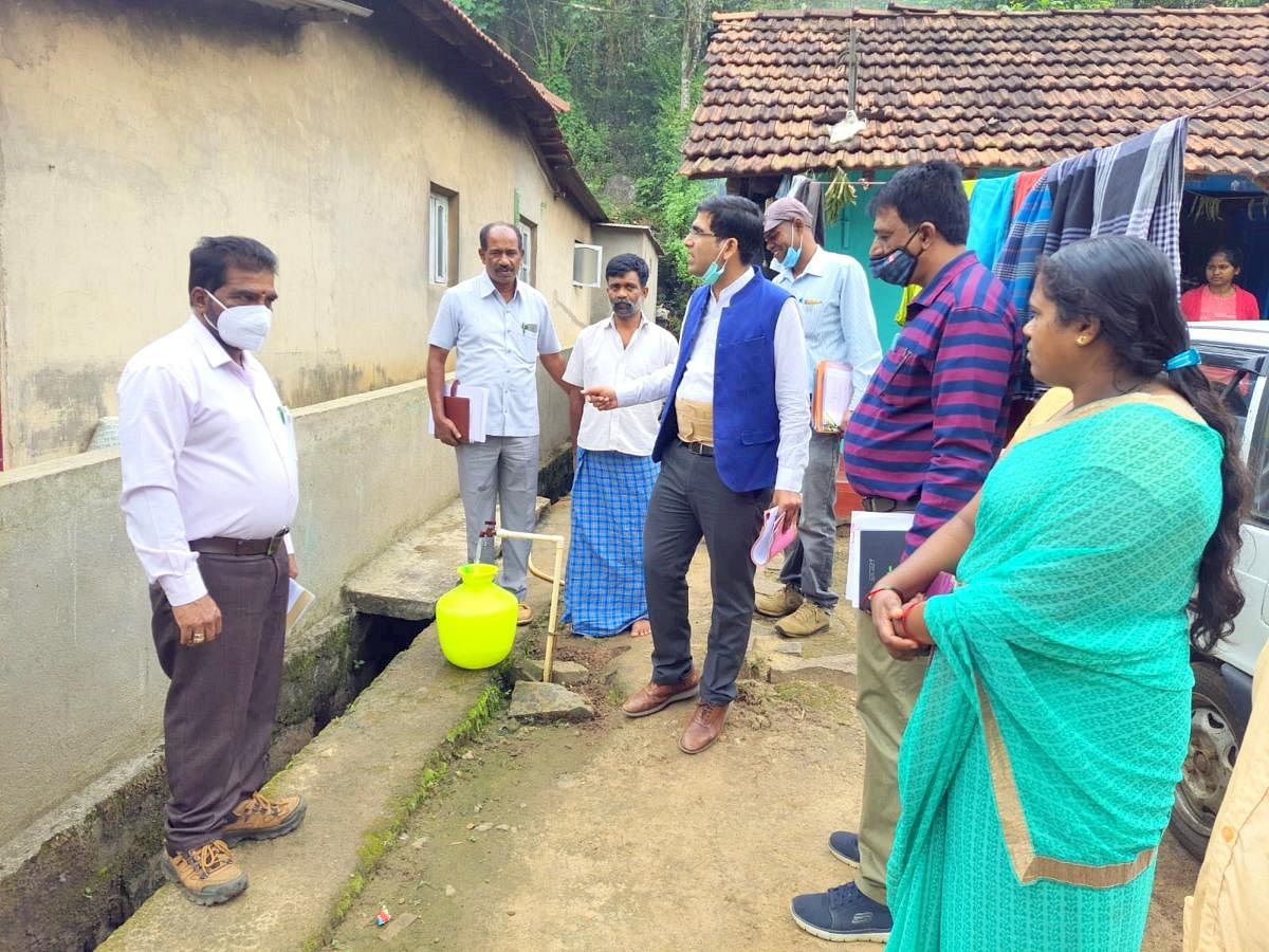 Zilla Panchayat CEO Bhanwar Singh Meena visits a project site of the Jal Jeevan Mission, in Byadagotta Gram Panchayat limits, near Shanivarasanthe.