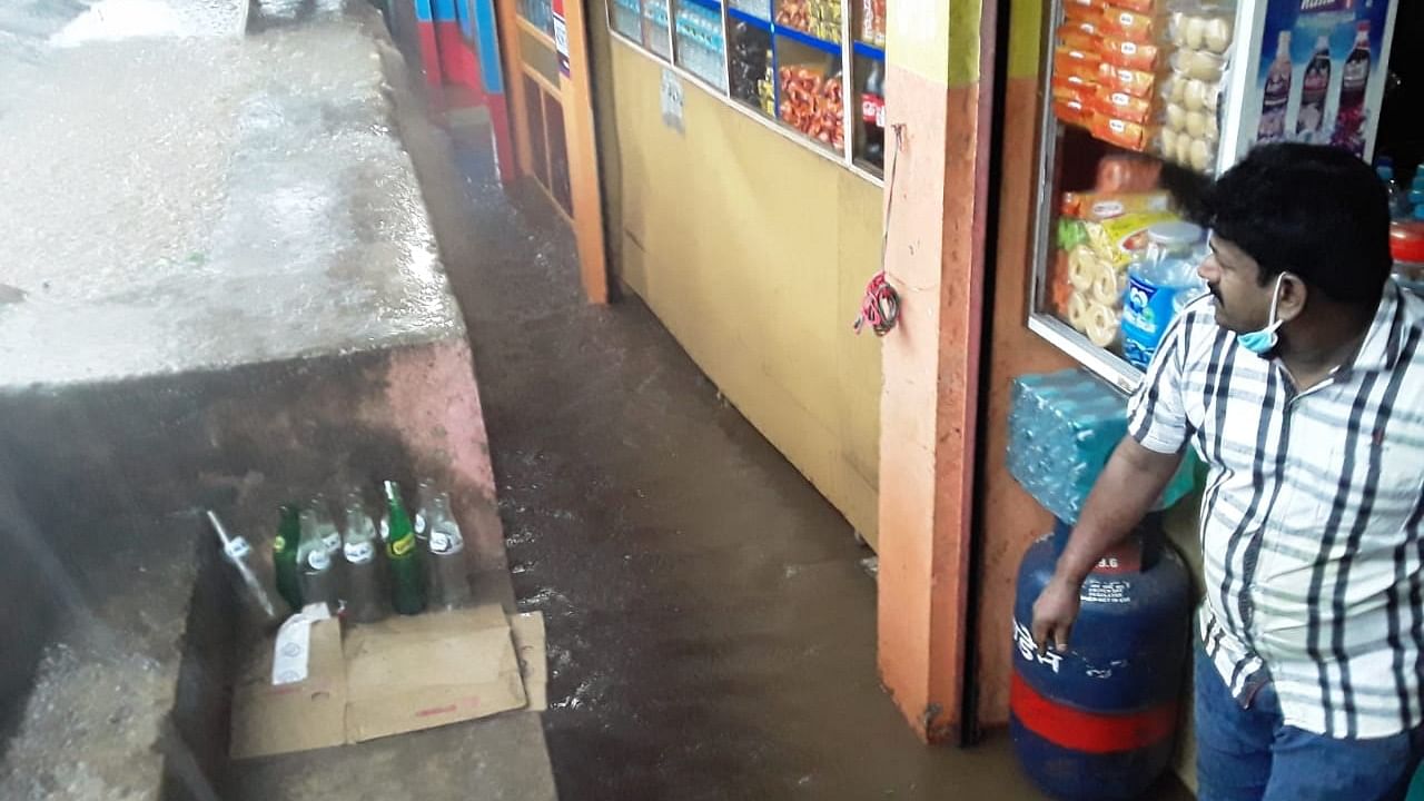 Rain water had entered shops in Koppa. Credit: DH Photo