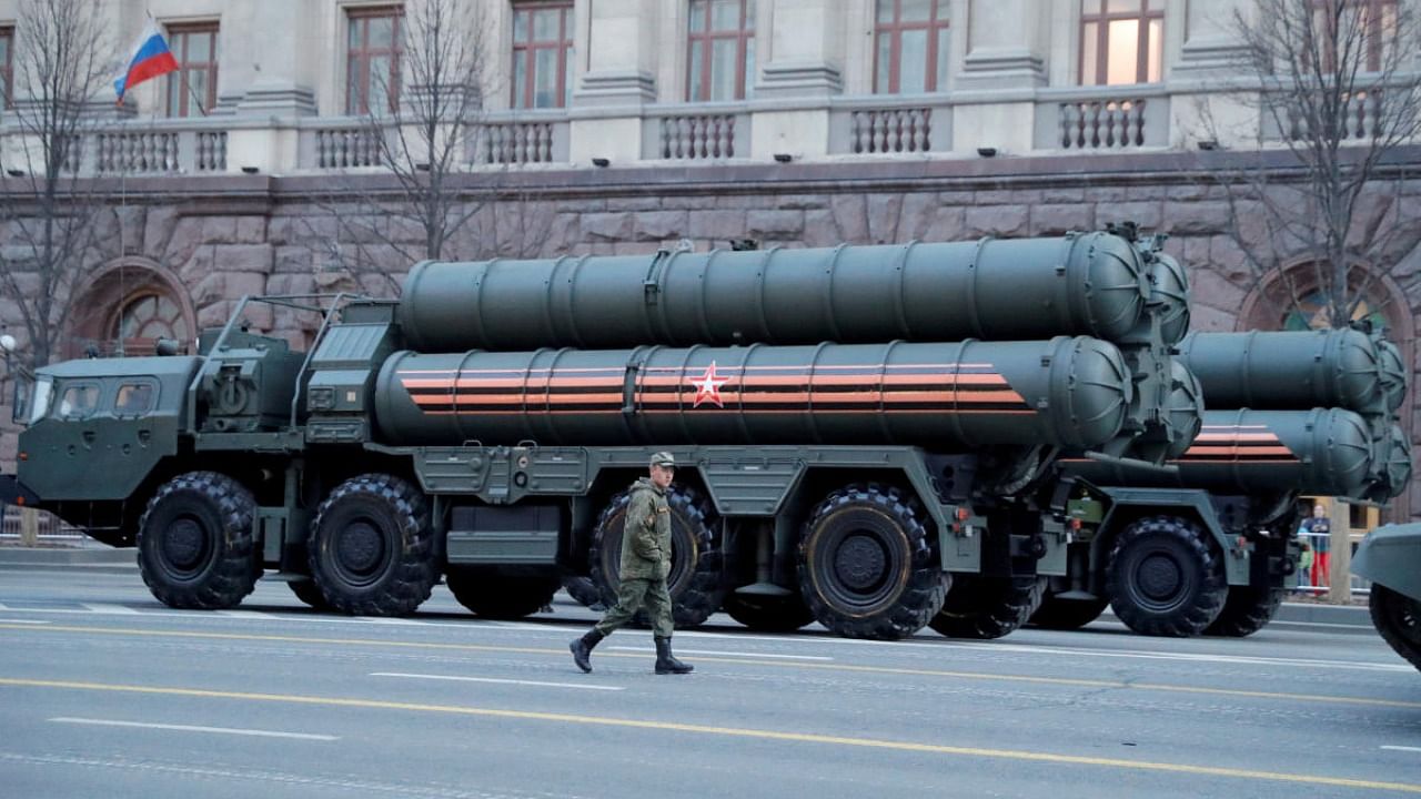 A Russian serviceman walks past S-400 missile air defence systems in Tverskaya Street. Credit: Reuters photo