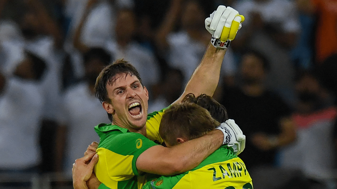 Australia's Mitchell Marsh (L) celebrates their win with teammates at the end of the ICC men’s Twenty20 World Cup. Credit: AFP Photo