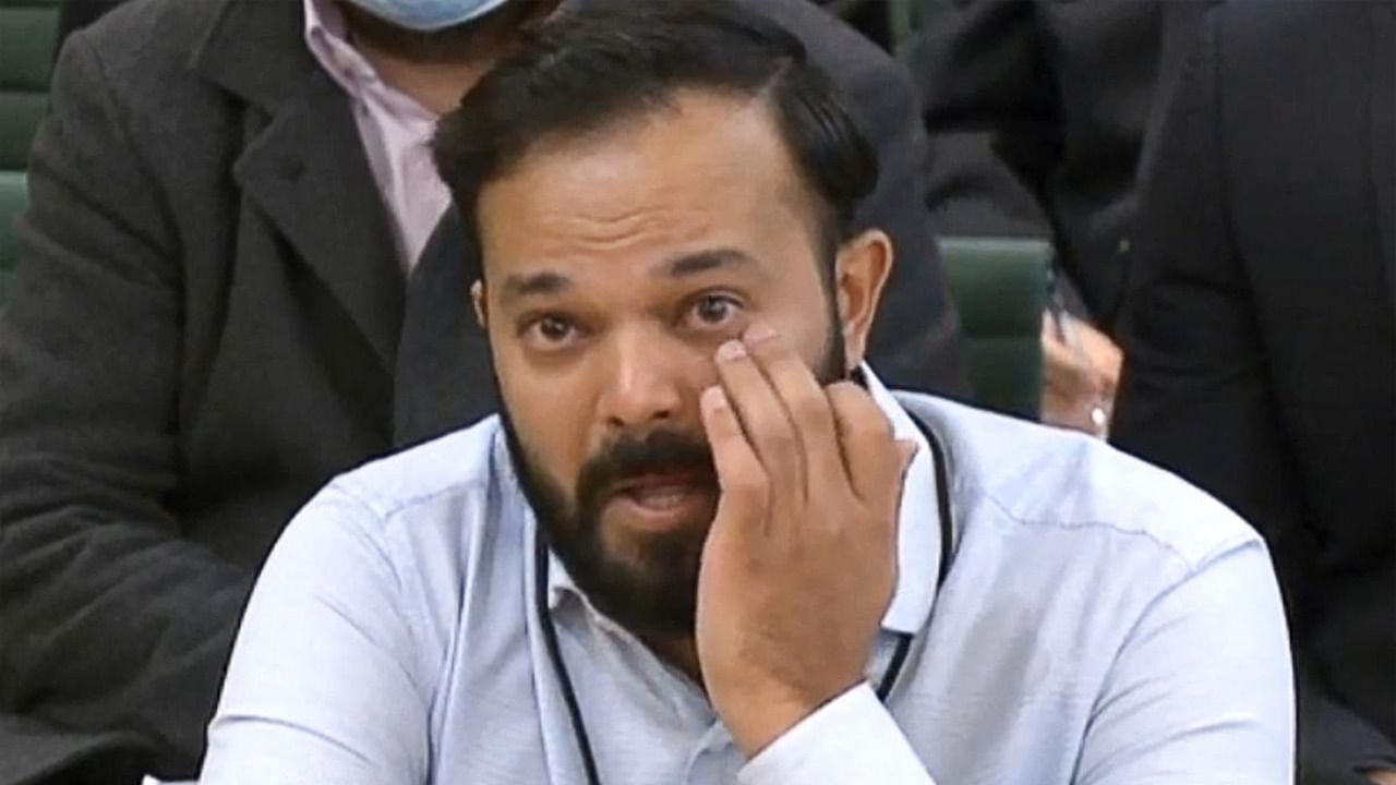 A video grab from footage broadcast by the UK Parliament's Parliamentary Recording Unit (PRU) shows former Yorkshire cricketer Azeem Rafiq fighting back tears while testifying in front of a Digital, Culture, Media and Sport (DCMS) Committee in London on November 16, 2021 as MPs probe racial harassment at the club. Credit: AFP Photo