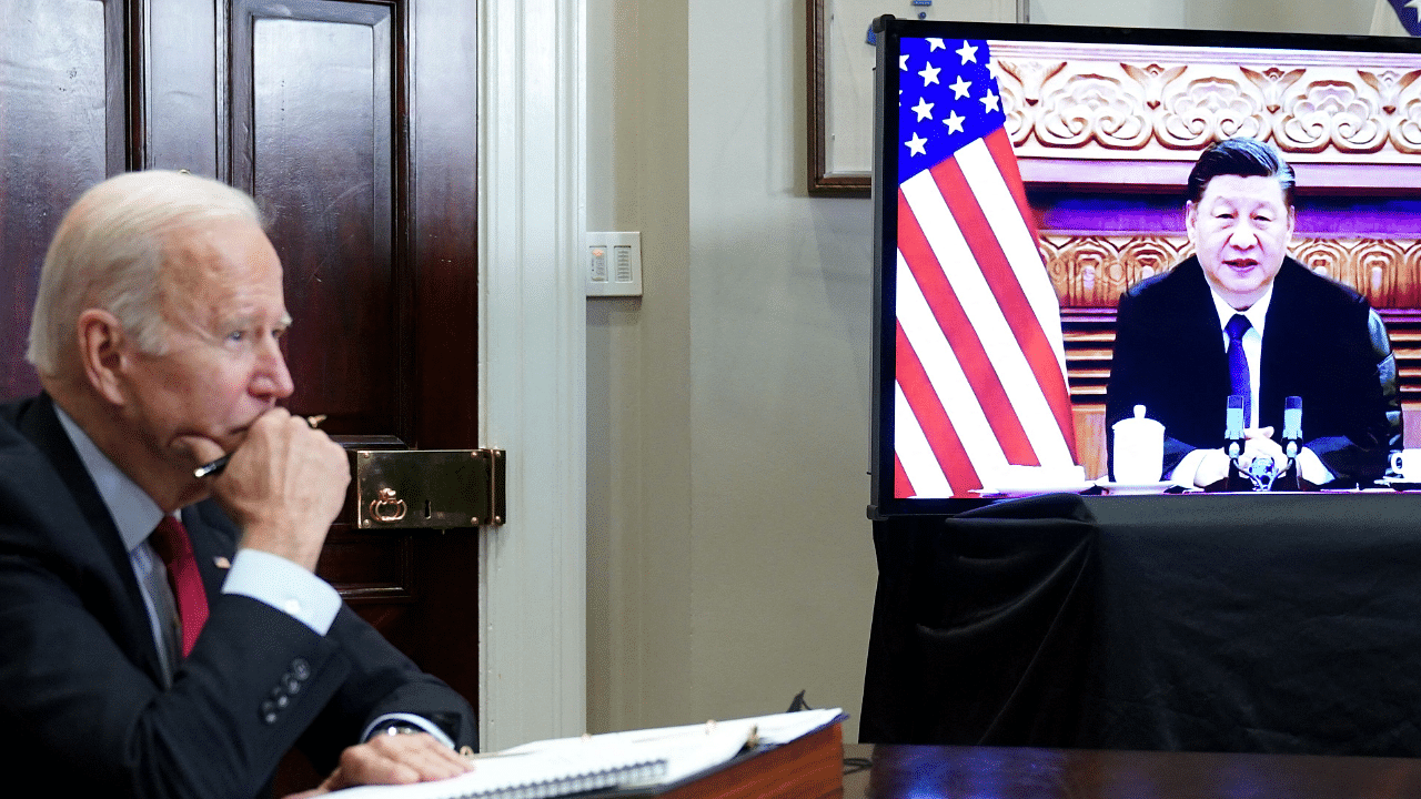 US President Joe Biden meets with China's President Xi Jinping during a virtual summit. Credit: AFP Photo