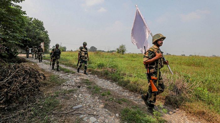 BSF personnel patrol near the International border in Pargwal. Credit: PTI File Photo