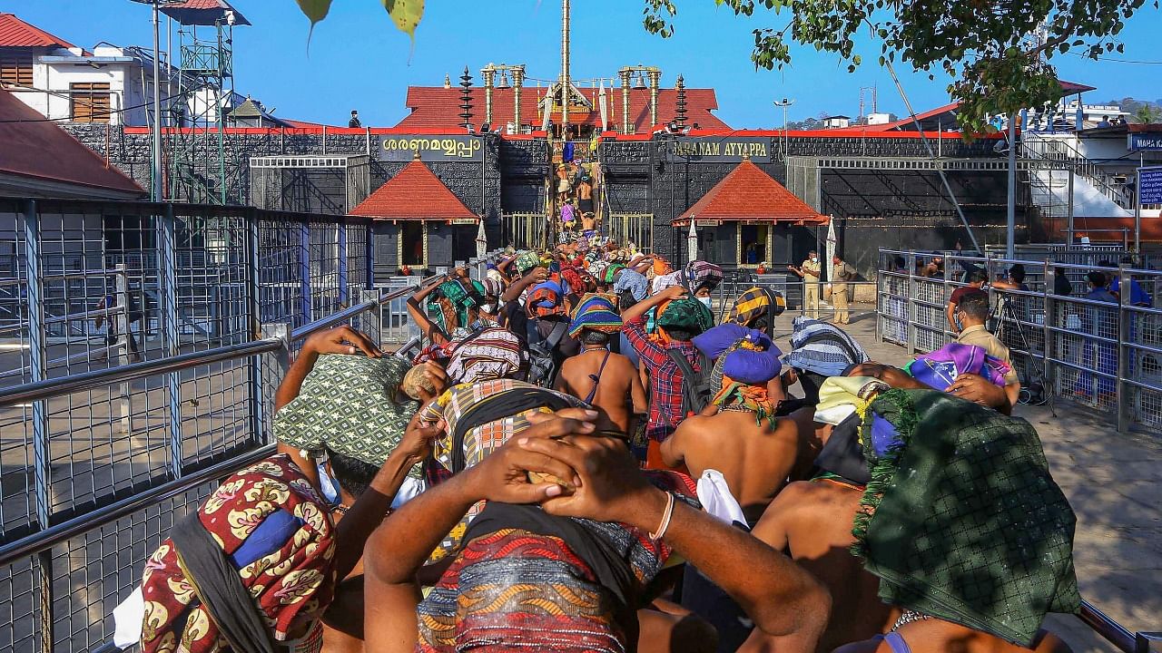 A file photo of devotees arriving for the 'Mandala Puja', at Sabarimala Temple in Pathanamthitta district. Credit: PTI Photo