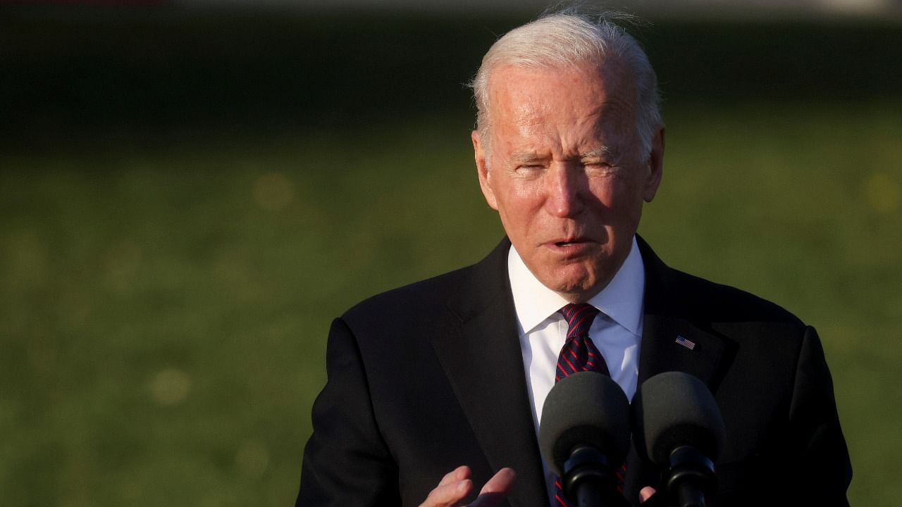 US President Biden signs the "Infrastructure Investment and Jobs Act", in Washington. Credit: Reuters Photo