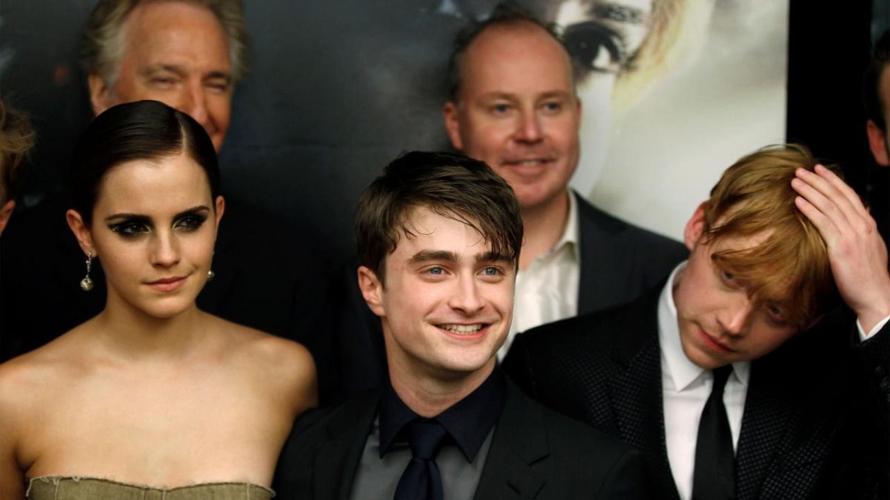 File Photo of Harry Potter cast members Rupert Grint (R), Daniel Radcliffe and Emma Watson (L). Credit: Reuters Photo