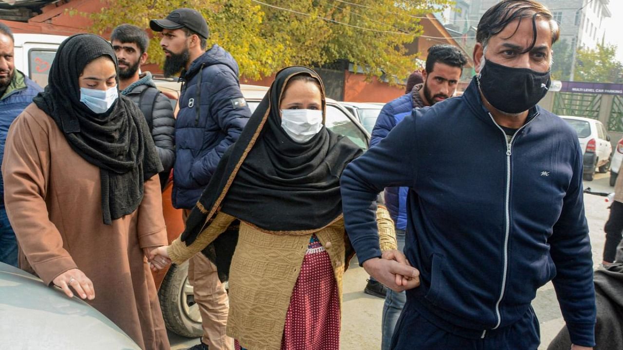 Family members of alleged OGW Mudasir Gul during their protest demanding Gul's body for last rites, in Srinagar, Tuesday, Nov 16, 2021. Gul was killed in Hyderpora encounter. Credit: PTI Photo