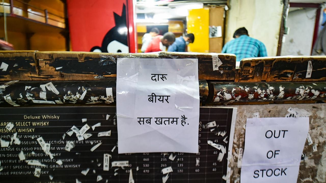 Notices read 'Out of Stock', at a liquor shop in New Delhi. Credit: PTI Photo