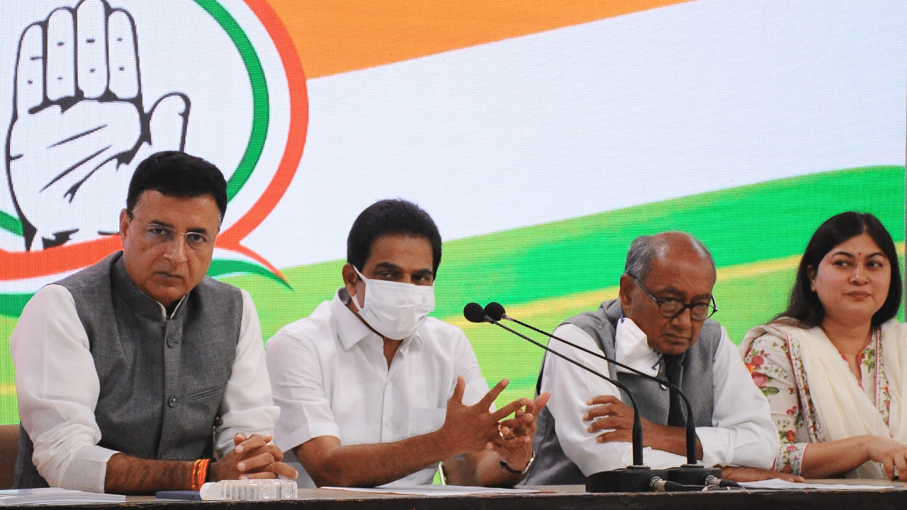 Congress leaders K.C.Venugopal, Digvijay Singh and Randeep Surjewala. Credit: IANS Photo