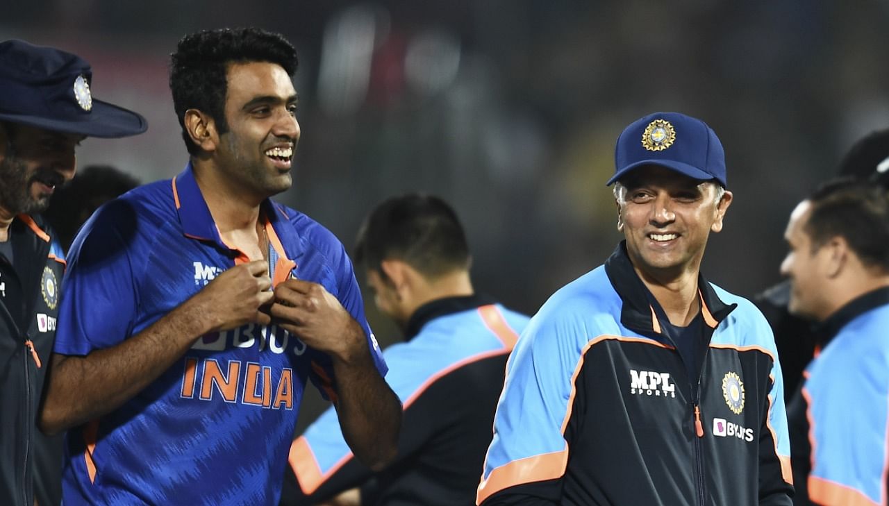 Indian cricket team's head coach Rahul Dravid with cricketer Ravichandran Ashwin after winning their first Twenty20 cricket match against New Zealand. Credit: PTI Photo