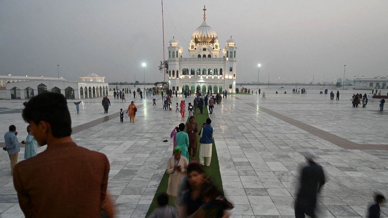 Sikh pilgrims arrive to take part in a religious ritual at the Gurdwara Darbar Sahib in Kartarpur near the India-Pakistan border. Credit: AFP File Photo