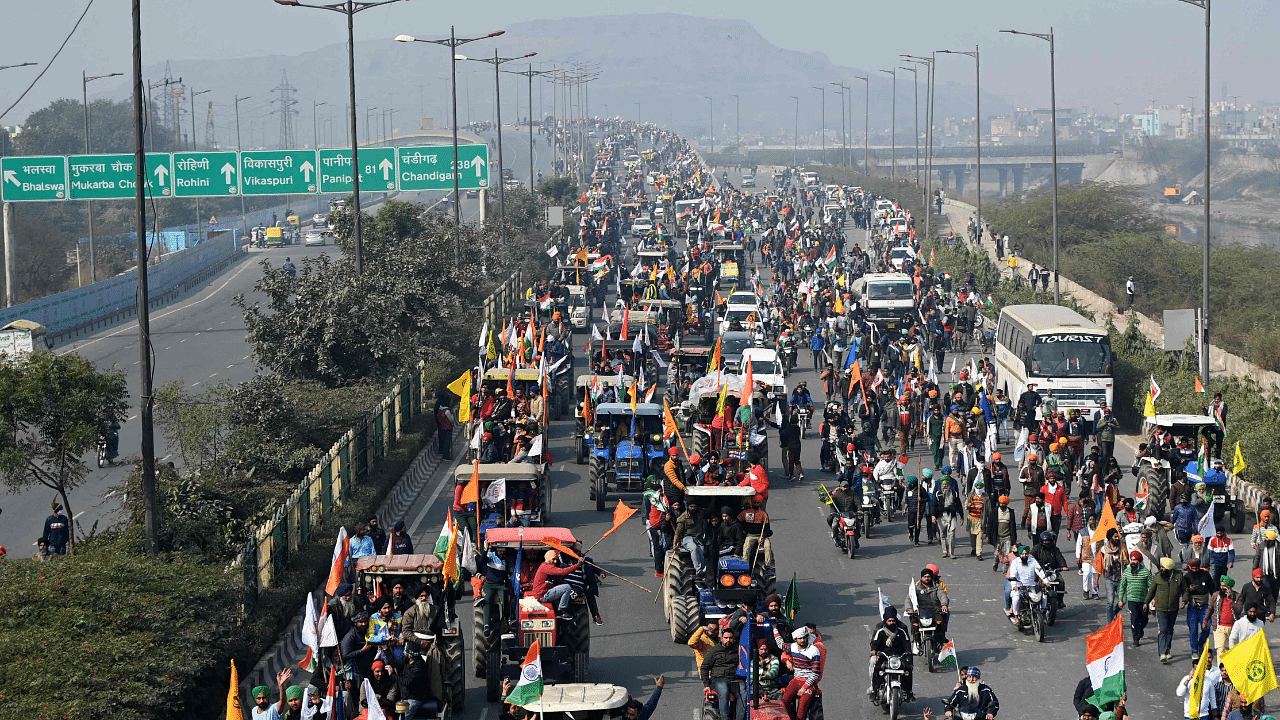 In this file photo taken on January 26, 2021 farmers take part in a tractor rally as they continue to demonstrate against the central government's recent agricultural reforms in New Delhi. Credit: AFP Photo