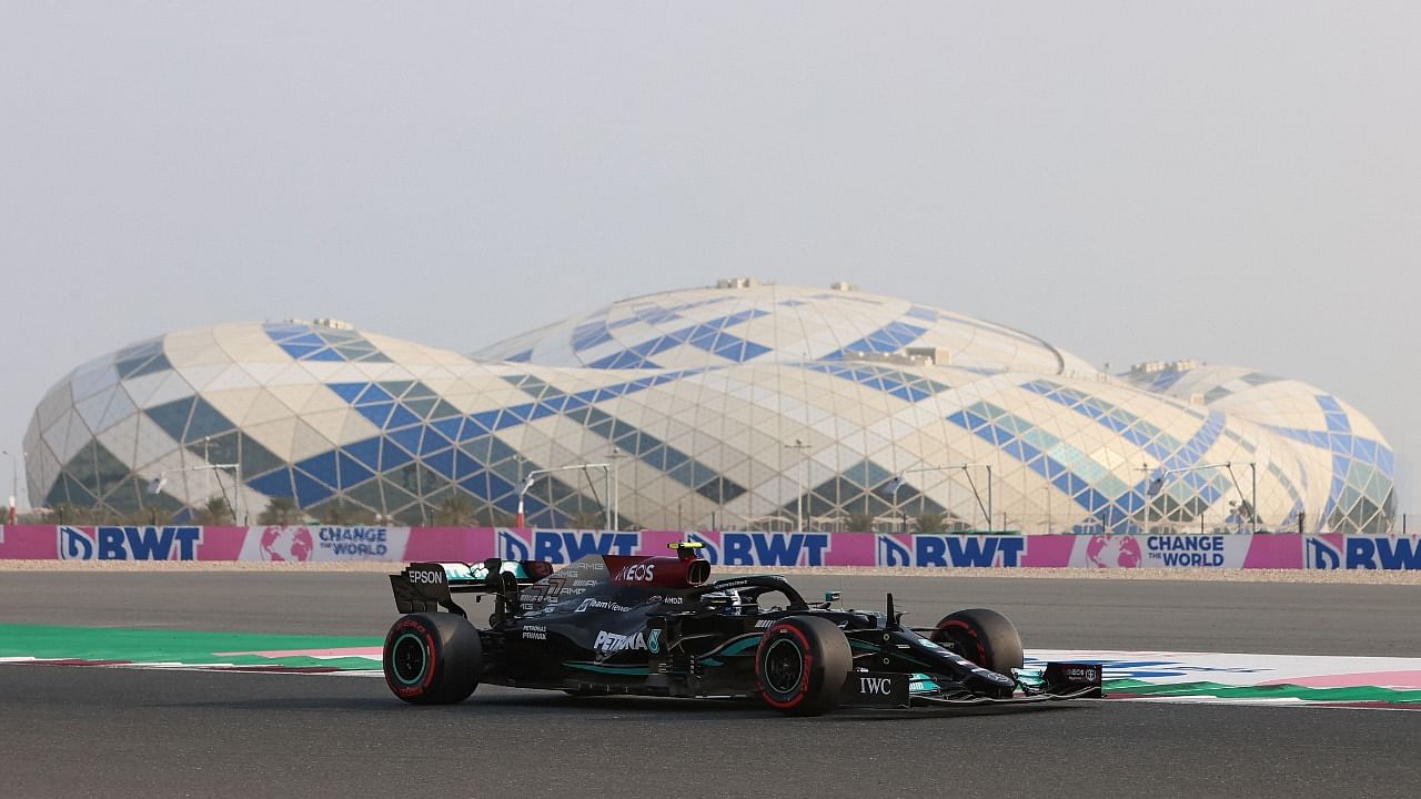 Bottas (in pic) topped the time sheets with a 1min 22.310, a record fastest lap at the Losail circuit's inaugural Formula One weekend. Credit: AFP Photo