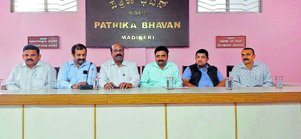 B S Lokesh Sagar, an aspirant for the post of president of Kannada Sahitya Parishat district unit, speaks to reporters in Madikeri.