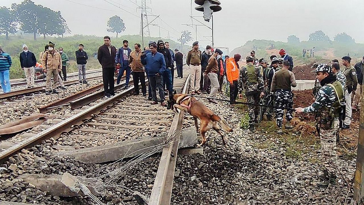 Security forces and South Eastern Railway (SER) officials investigate the spot after CPI-Maoist rebels blew up a railway track in between Richughuta Station-Demu Station at Tori-Latehar Rail Line, in Latehar district. Credit: PTI Photo