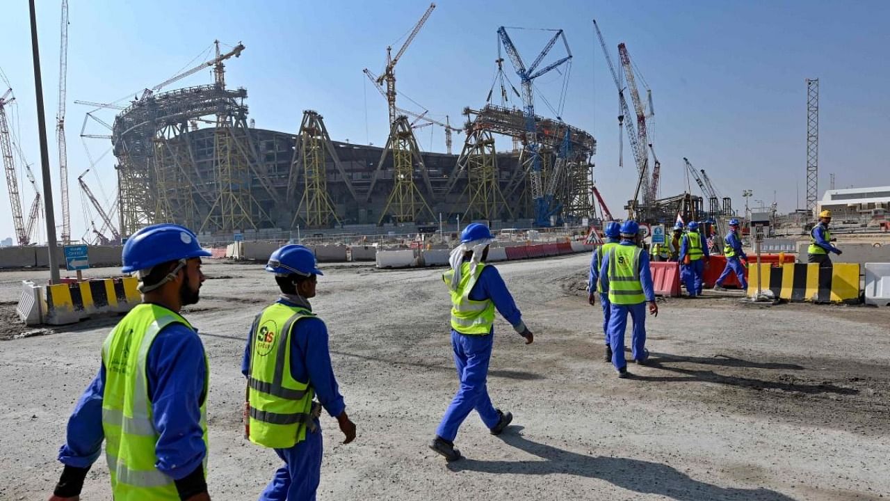 Construction workers at Qatar's Lusail Stadium, one of the Qatar's 2022 World Cup stadiums, around 20 kilometres north of the capital Doha. Credit: AFP Photo