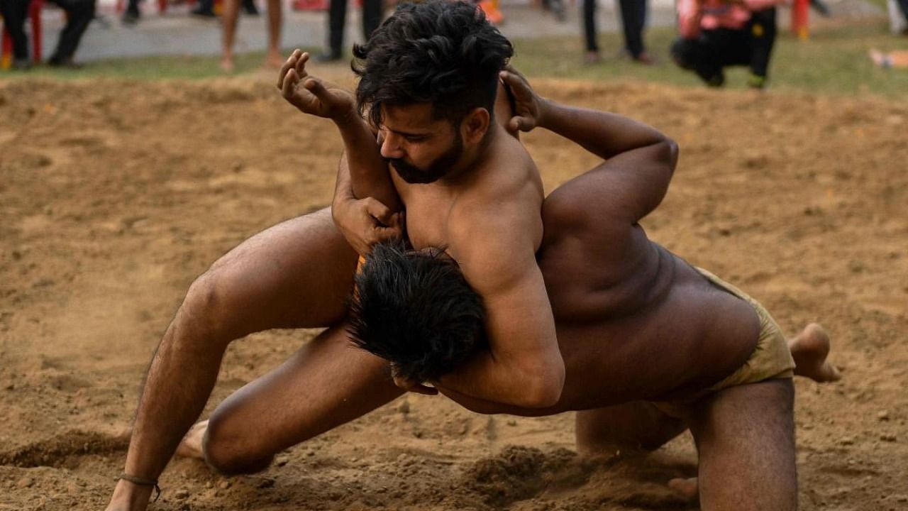 While the money and fame at stake have accentuated competition between akharas, their inability to produce world-class wrestlers has frustrated budding pehelwans. Credit: AFP Photo