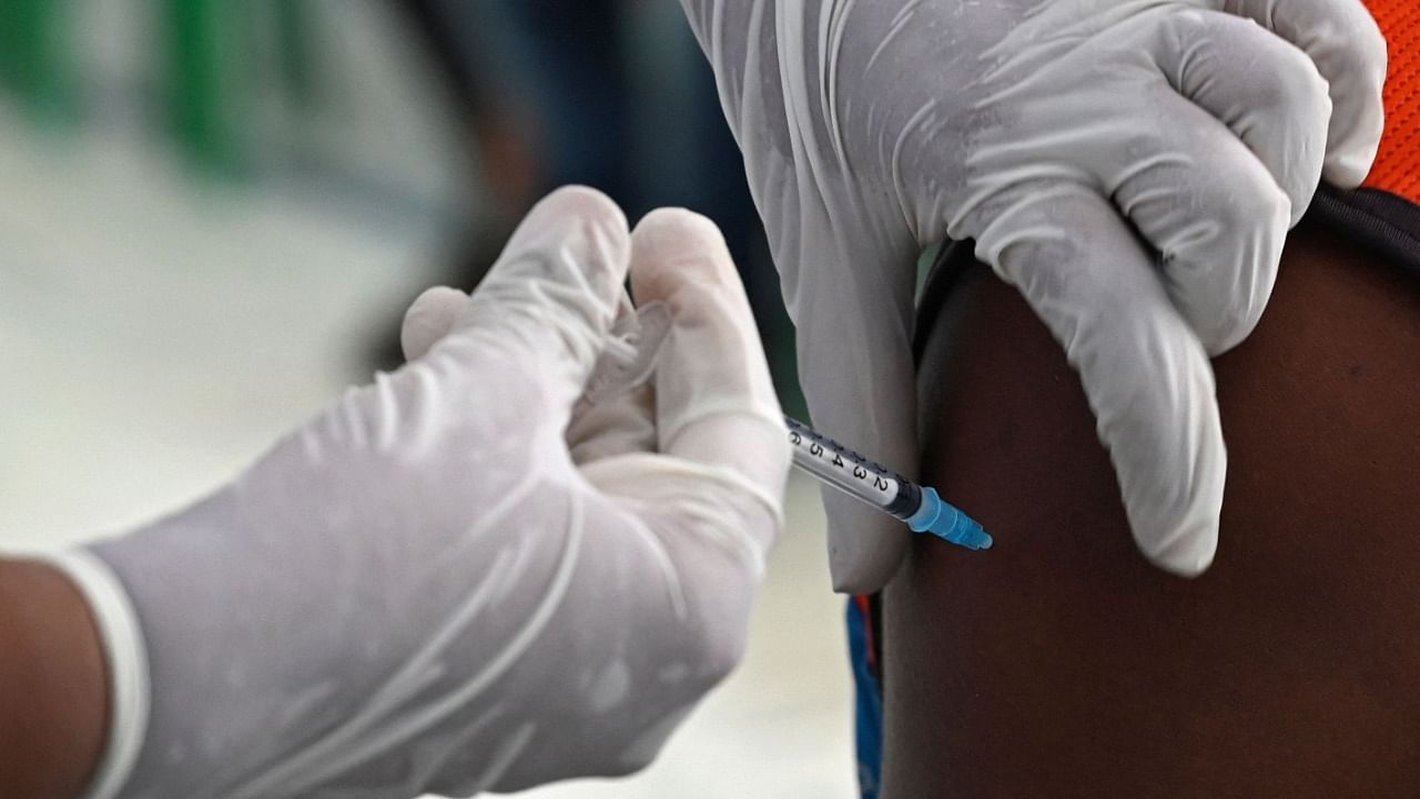 The government has launched the month-long 'Har Ghar Dastak' campaign for house-to-house Covid-19 vaccination of those who are yet to take a dose. Credit: AFP File Photo