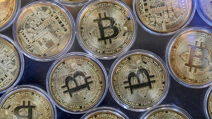 Notably, there have been a rising number of advertisements, featuring even film stars, promising easy and high returns on investments in cryptocurrencies in recent times. Credit: AFP File Photo