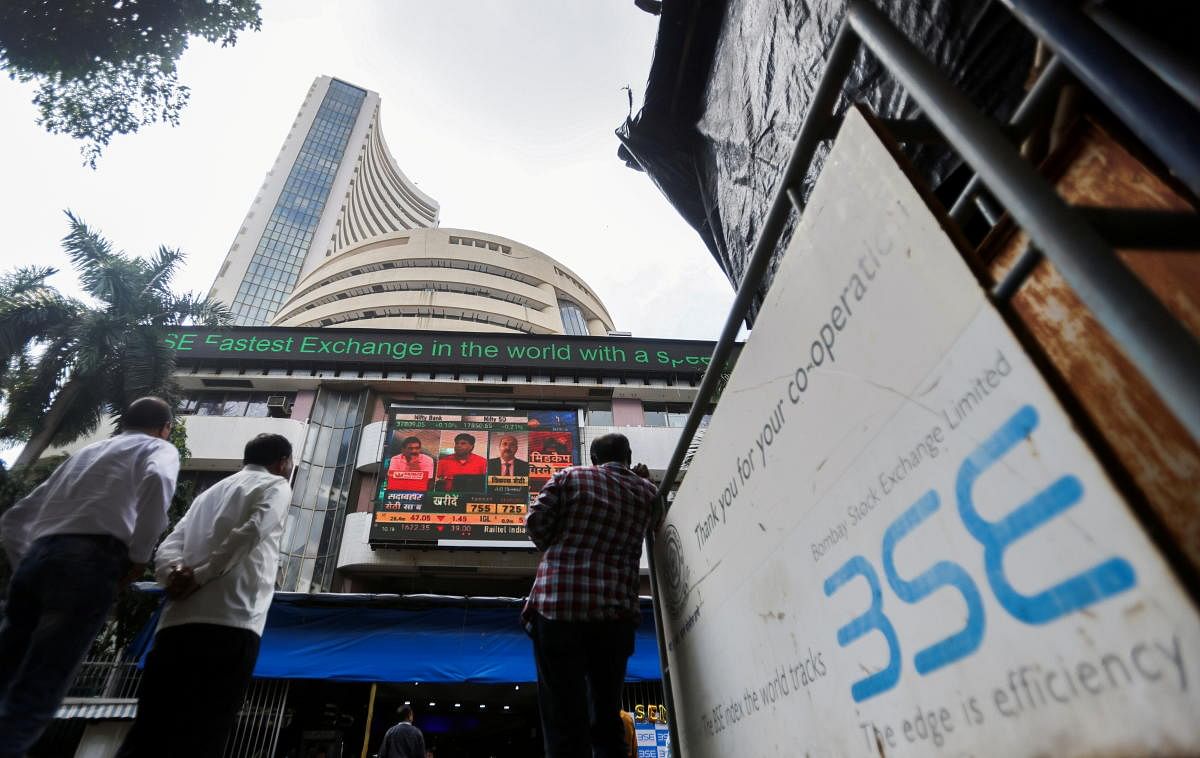 People standing outside the Bombay Stock Exchange (BSE) in Mumbai. Credit: Reuters Photo