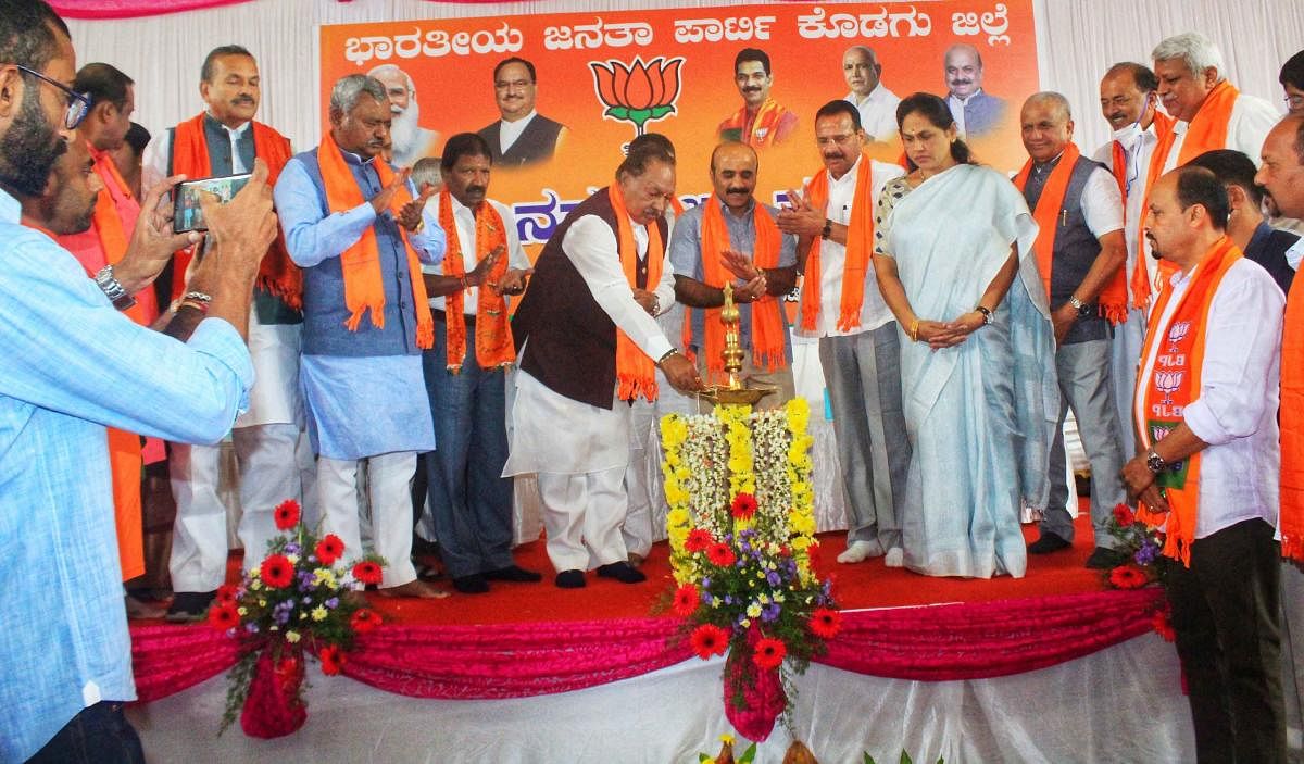 Rural Development Minister K S Eshwarappa inaugurates the Jana Swaraj Samavesha in Madikeri on Monday. DH Photo