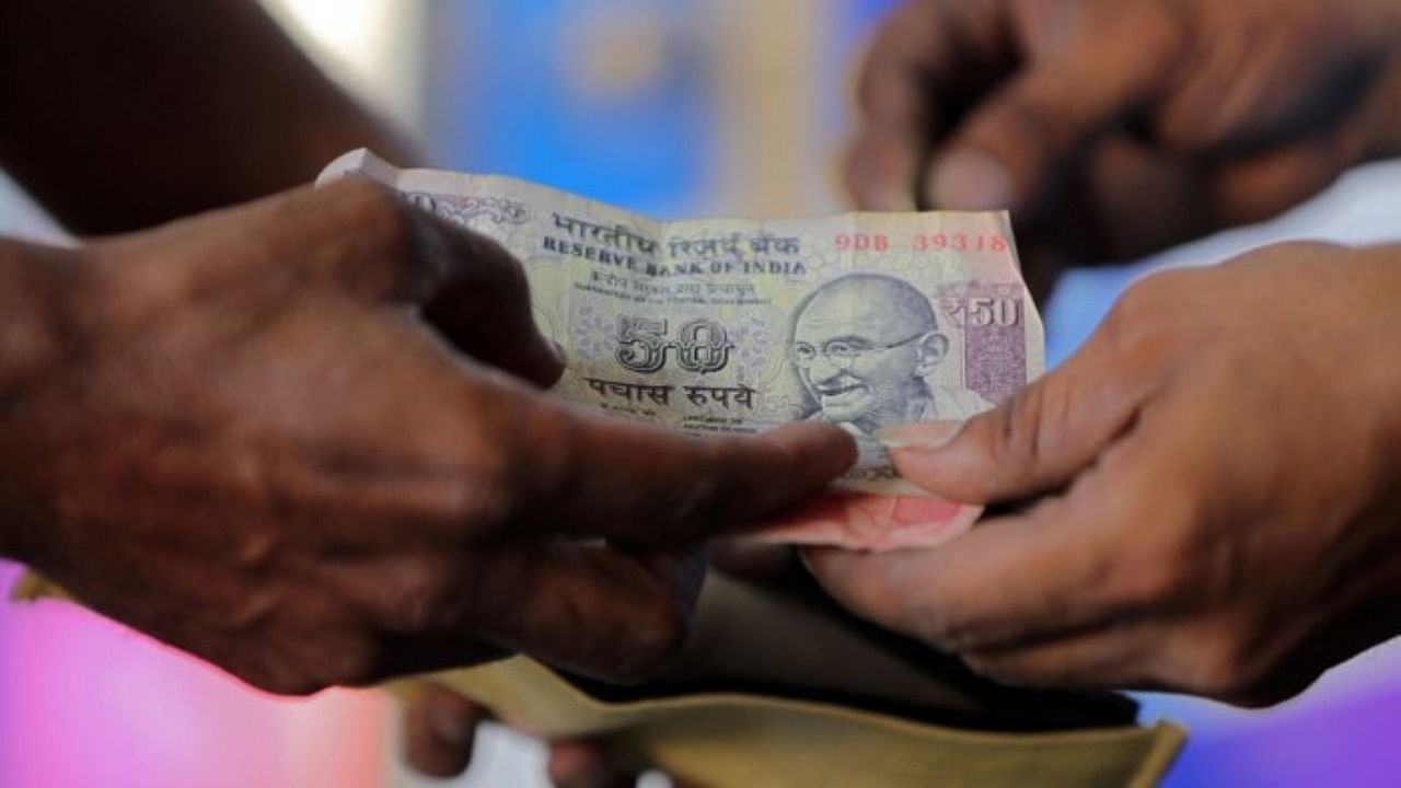 At the interbank foreign exchange, the rupee opened on a weak note at 74.48. Credit: Reuters Photo
