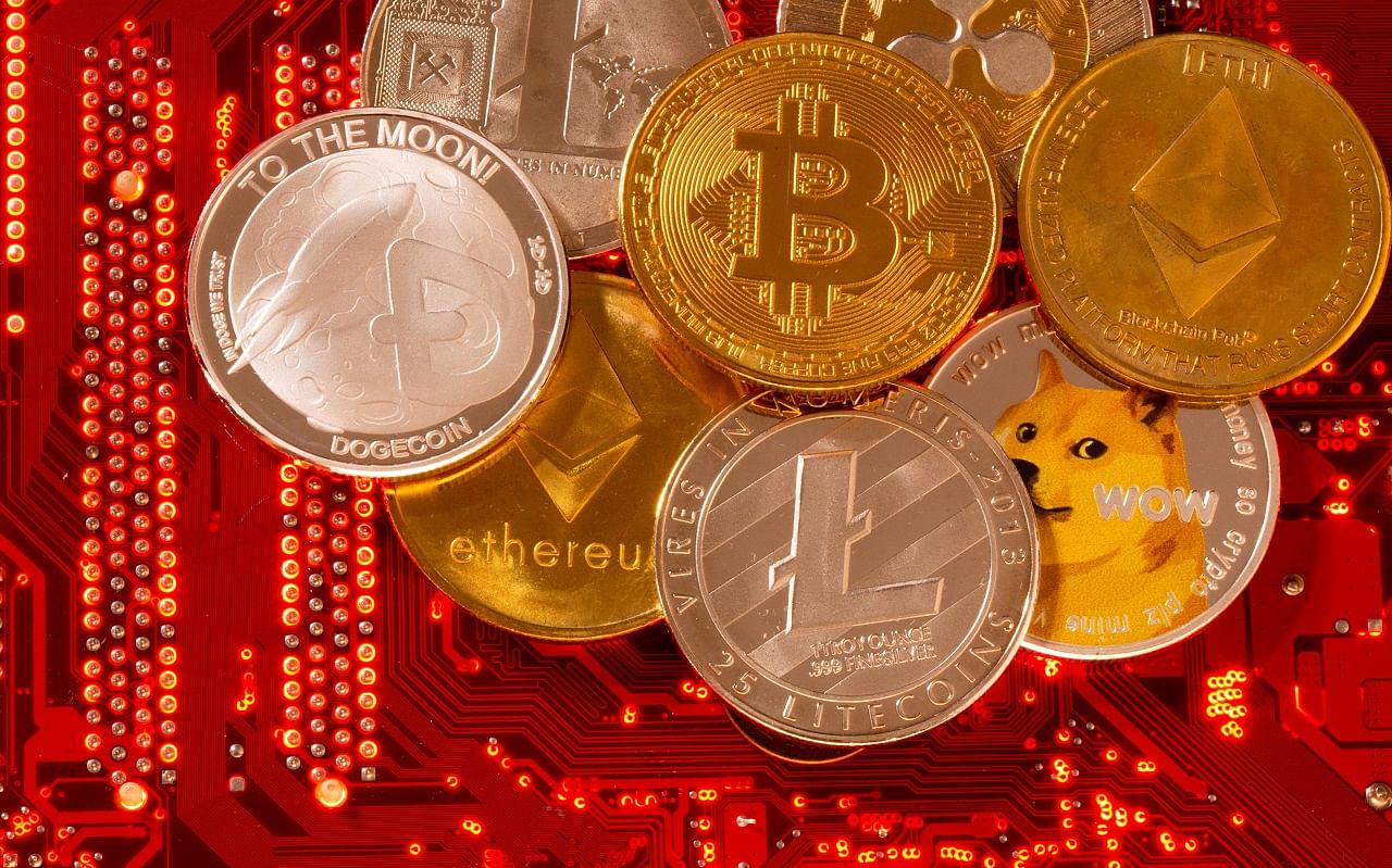 Representations of cryptocurrencies Bitcoin, Ethereum, DogeCoin, Ripple, Litecoin. Credit: Reuters Photo
