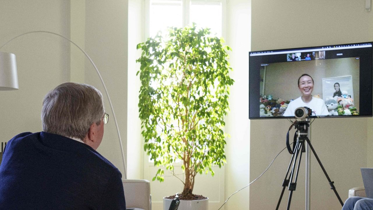 IOC President Thomas Bach holding a video call with Peng. Credit: AFP Photo/IOC