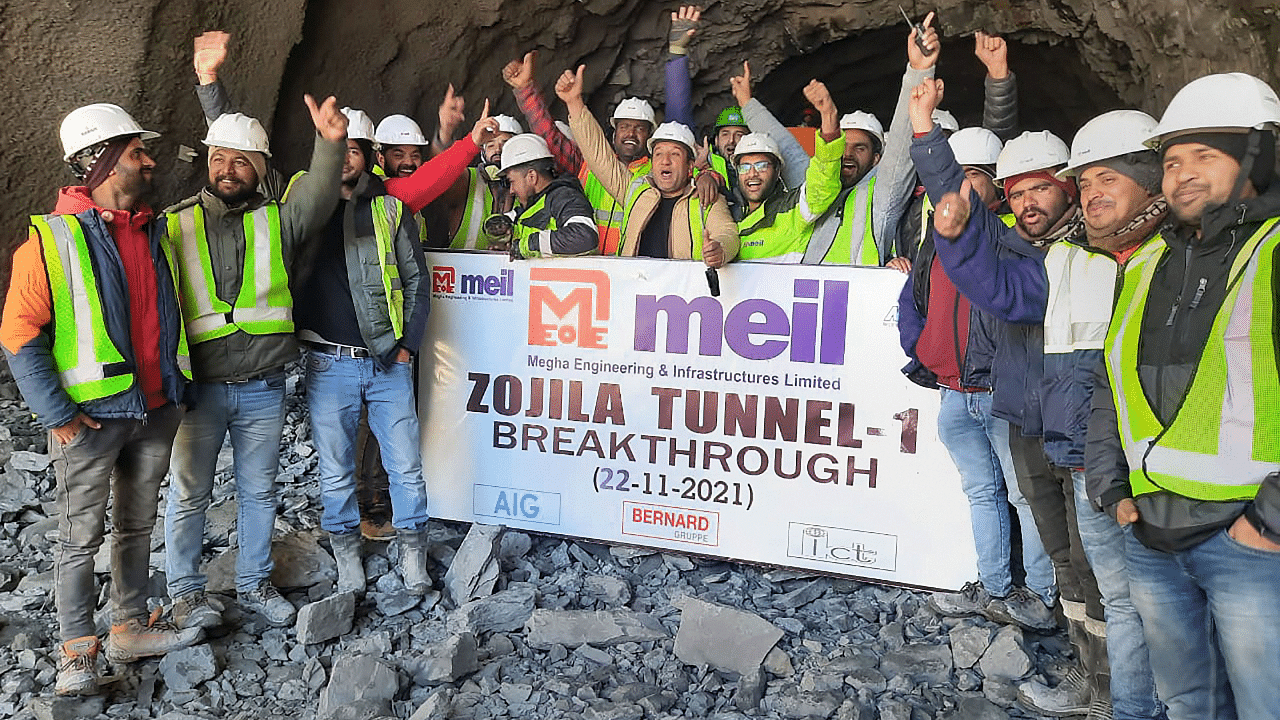 Infrastructure company MEIL workers after completing excavation work of tunnel 1 of the all weather Zoji La Tunnel Project that will connect Srinagar to Ladakh. Credit: PTI Photo