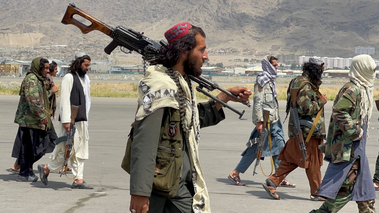 Taliban forces patrol at a runway a day after US troops withdrawal from Hamid Karzai International Airport in Kabul. Credit: Reuters File Photo