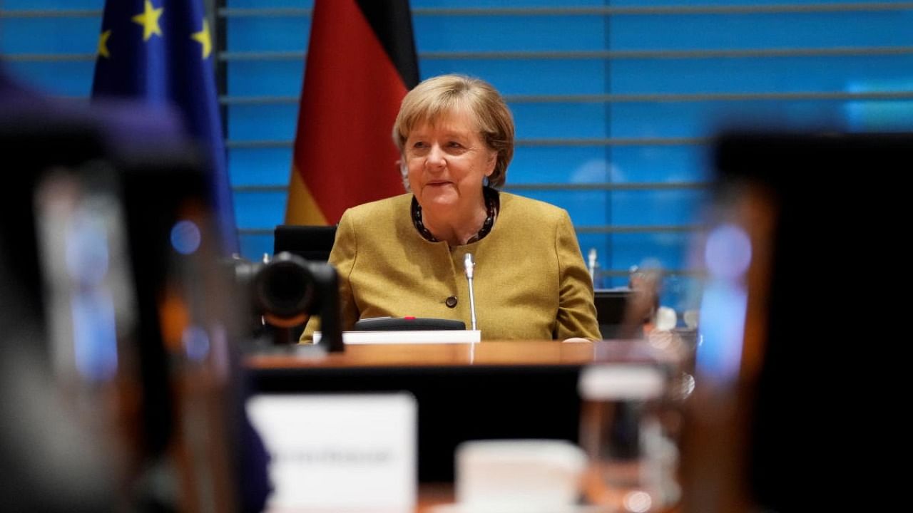 Acting German Chancellor Angela Merkel leads the weekly cabinet meeting at the Chancellery in Berlin, Germany. Credit: Reuters Photo