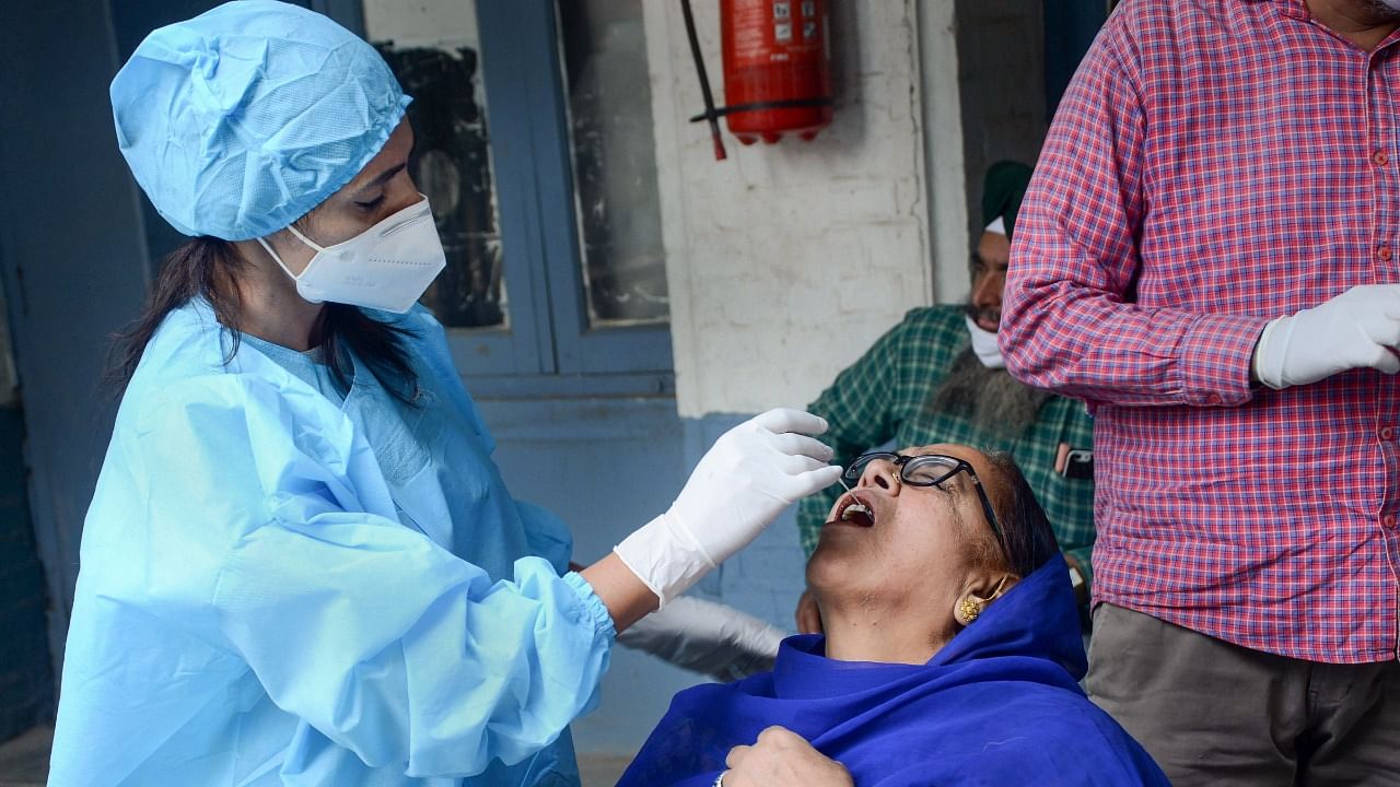 The ministry has directed the states to maintain the momentum and build on the progress made so far to bring the pandemic situation under control. Credit: PTI Photo