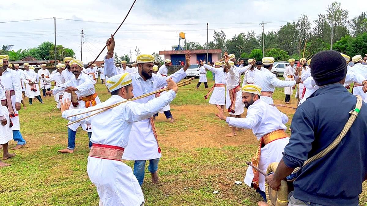 People perform Huthari Kolata in the 'Nad Mandh' at Haleri village near Suntikoppa.