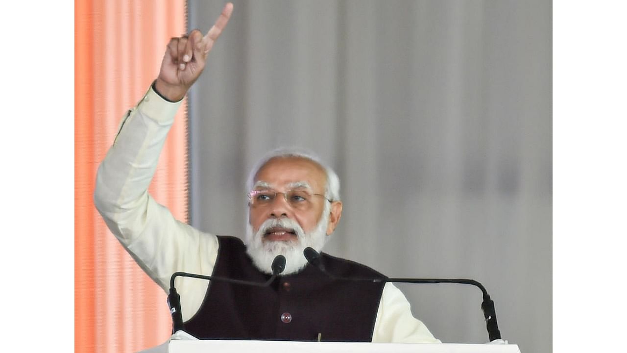 Prime Minister Narendra Modi speaks during the foundation stone laying ceremony for the Noida International Airport at Jewar, in Gautam Buddha Nagar district. Credit: PTI Photo