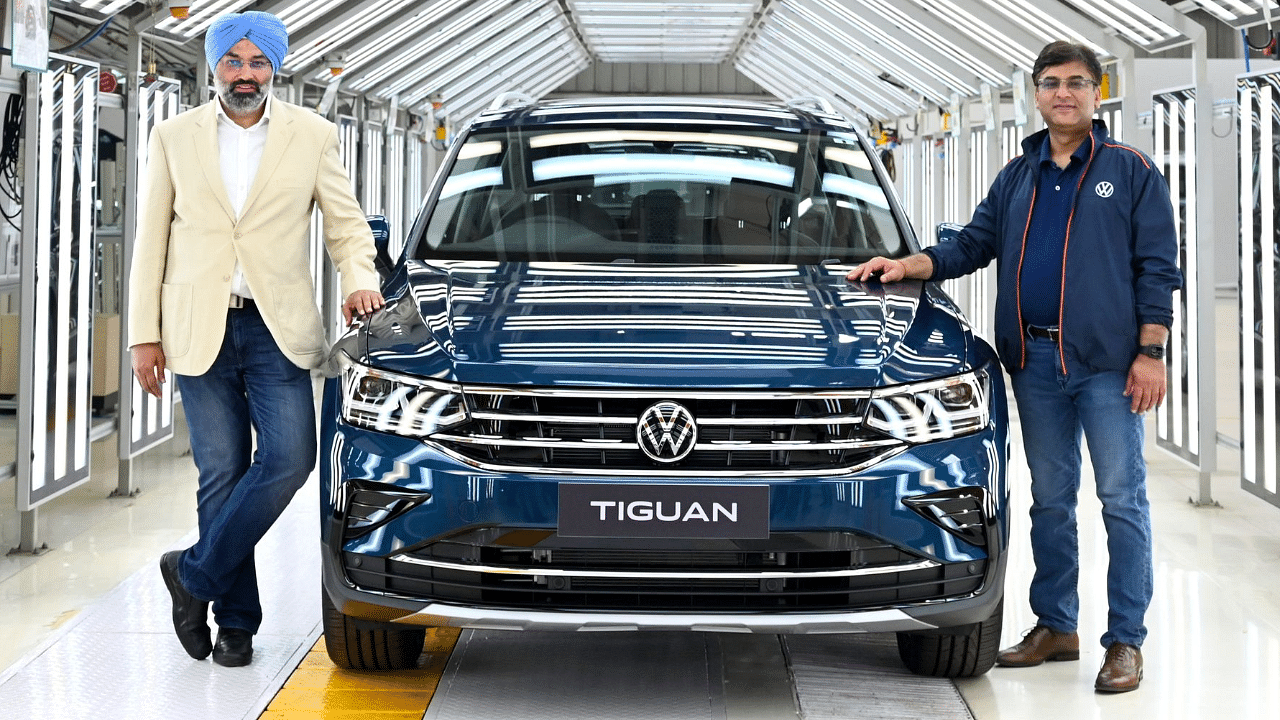 (From left) Gurpratap Boparai, Managing Director, SAVWIPL, and Ashish Gupta, Brand Director, Volkswagen Passenger Cars India, with the Tiguan