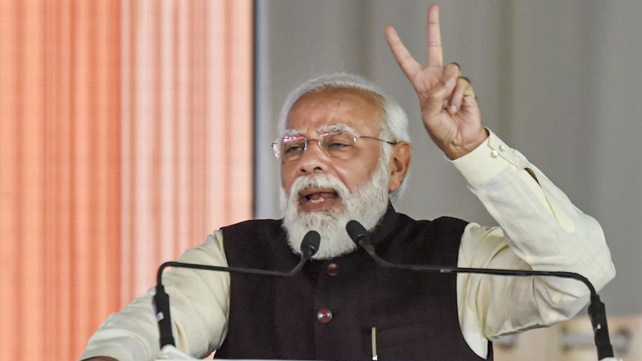 Prime Minister Narendra Modi speaks during the foundation stone laying ceremony for the Noida International Airport at Jewar, in Gautam Buddha Nagar district. Credit: PTI Photo