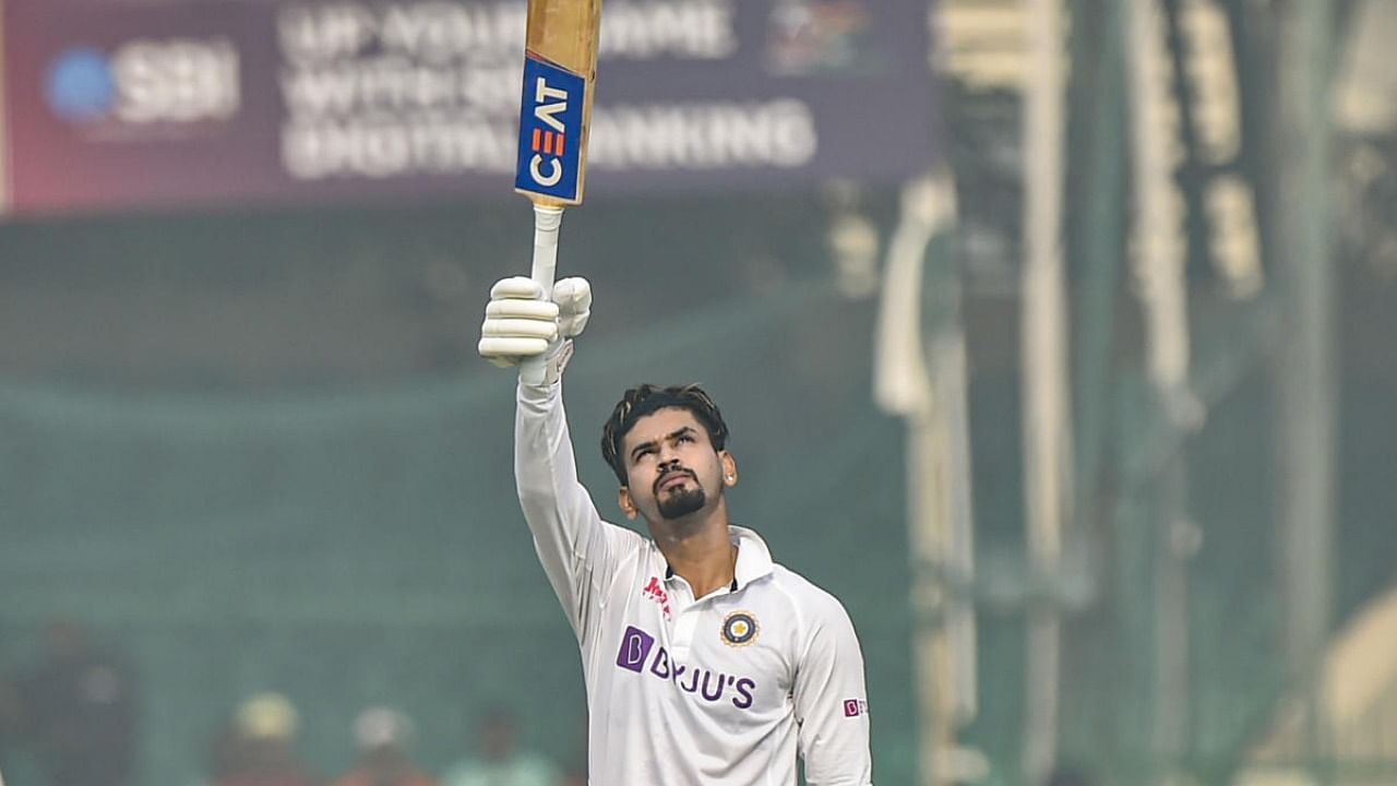 India's Shreyas Iyer celebrates after scoring century during the second day of the first test cricket match between India and New Zealand, at the Green Park Stadium, in Kanpur. Credit: PTI Photo