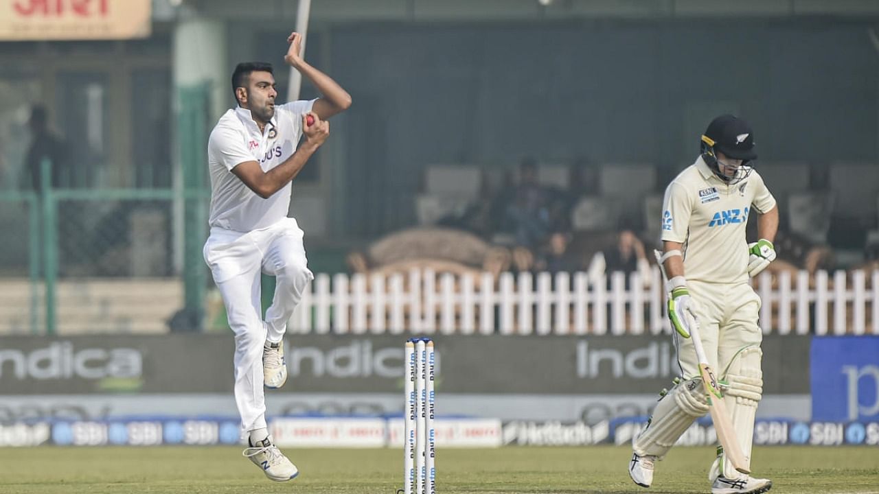 India's Ravichandran Ashwin bowls during third day of the first Test cricket match between India and New Zealand, at Green Park stadium in Kanpur. Credit: AFP Photo